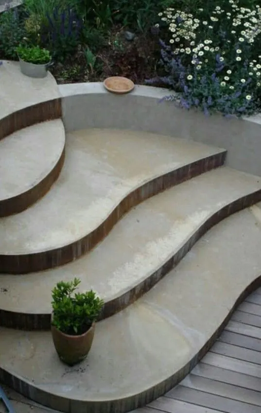 Curved concrete porch steps detail